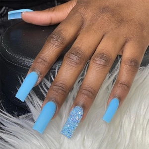 Extra long sky blue coffin press-on nails with glitter accent and rhinestone details