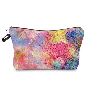 Detailed view of the mandala pattern and colorful watercolor print on the travel makeup bag