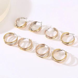 Three-tone tricolor titanium steel oval hoop earrings in gold, silver and rose gold