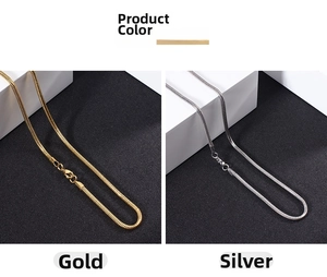 Detail view of snake bone chains in gold and silver steel finish with lobster clasp