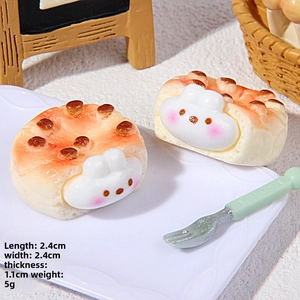 Detail of miniature resin bunny-shaped bread model with measurements 2.4x2.4x1.1cm