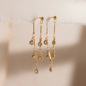Elegant 18K gold-plated stainless steel tassel earrings with sparkling cubic zirconia