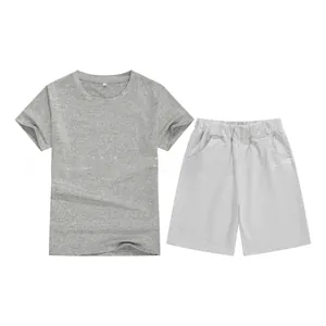 Flat lay of kid's soft cotton short-sleeve T-shirt and shorts set in grey tones