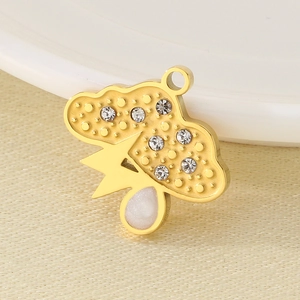 Gold cloud pendant with sparkling crystals and opal inlay on minimalist beige background