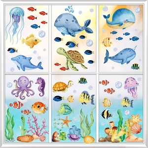 Detail of watercolor ocean animal decals showing whales, dolphins and sea turtles