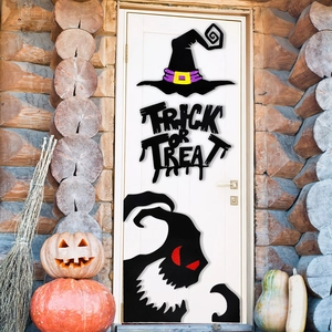 Halloween witch hat and ghost door stickers with Trick or Treat text on white door