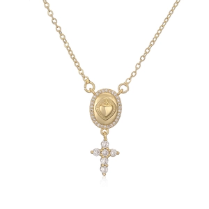 18K gold plated necklace with zircon-encrusted Sacred Heart and cross pendant on white back