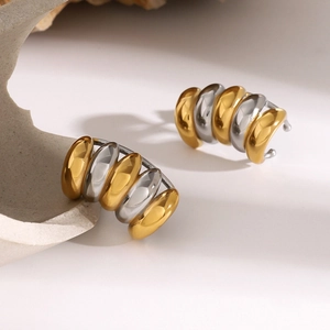 Minimalist 18k gold and silver stainless steel layered hoop earrings in a two-tone design