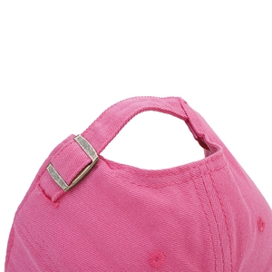 Close-up of bright rose pink cotton baseball cap with adjustable bronze metal buckle