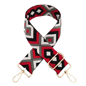 Detail of 5cm diamond jacquard bag strap with gold metal hooks and adjustable buckle