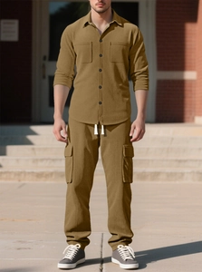 Detailed view of men's khaki corduroy two-piece set featuring shirt and cargo pants