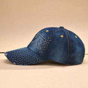 Distressed dark denim baseball cap with LOVE rhinestone patterns and contrast stitching