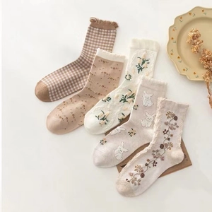Five pairs of women's vintage cotton mid-calf socks with floral and bunny embroidery