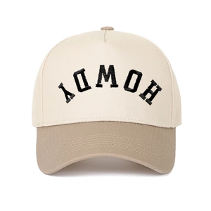 Close-up of contrast color baseball cap with Howdy embroidery and cotton stitching details