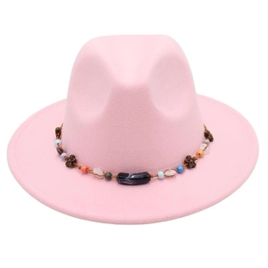 Detailed shot of pink wide-brimmed felt fedora hat featuring a bohemian colorful beaded band