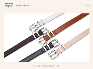 Close-up of five colorful thin belts with silver pin buckles for women fashion