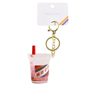 Creative coffee cup liquid quicksand keychain with red blue stripes and gold ring