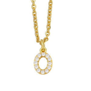 Macro shot of gold-plated O-letter pendant with pavé cubic zirconia on white background