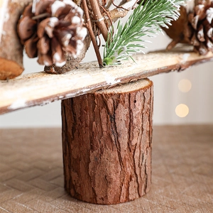 Minimalist wooden Christmas tree ornament with pine cones and natural needles decor