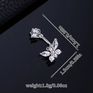 Macro detail of silver butterfly belly ring with zircon insets and size dimensions