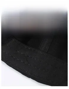 Detail view of the wide moisture-wicking sweatband inside a black baseball cap