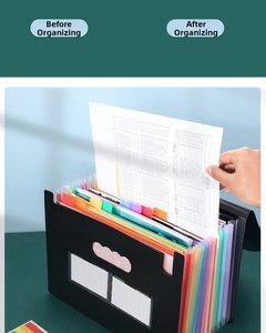 Detail of multi-layer rainbow expanding file folder with color-coded index tabs for A4 files