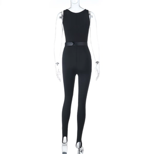 Back view of a black sleeveless stirrup jumpsuit with a matching belt on a mannequin