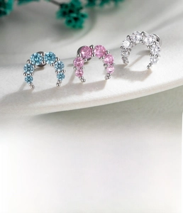 Detailed specs for blue, pink, and white zircon crescent moon cartilage piercings