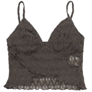 Detail of grey lace crop top featuring V-neckline and intricate floral fabric texture
