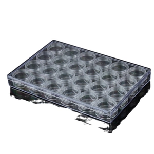 Clear acrylic storage box with 28 individual round jars for jewelry and nail art parts