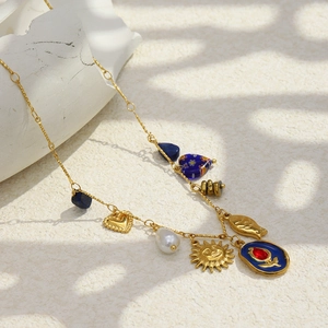 18K gold plated stainless steel multi-pendant necklace with heart, sun and pearl charms
