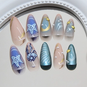 Blue ocean-themed almond press-on nails with 3D starfish, pearls and shell decorations