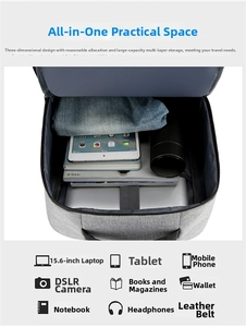 Detail view of the spacious inner compartments of the light gray business laptop backpack