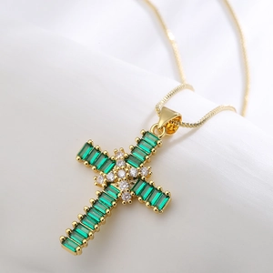 Gold-plated cross pendant necklace with emerald green stones and white rhinestones