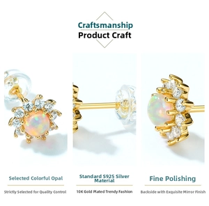 Macro detail of star-shaped S925 silver stud earrings with opal and zircon accents