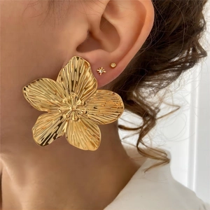 Vintage style oversized golden floral butterfly stud earrings in stainless steel