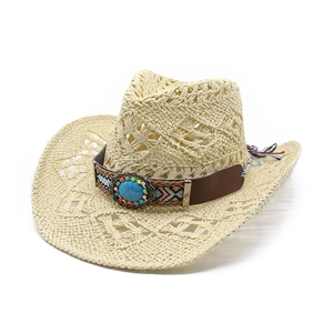 Hollow straw cowboy hat with turquoise bead band on a clean white background