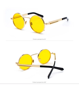 Detail view of steampunk round sunglasses featuring spring temples and yellow lenses
