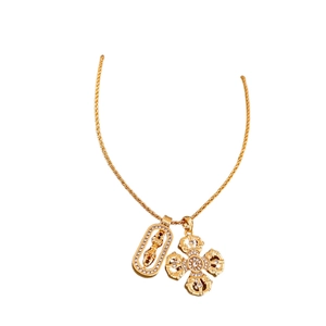 Gold pendant necklace with Vajra lock and flower motifs featuring pave-set rhinestones