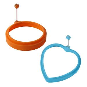 Orange round and blue heart silicone egg rings with metal handles on white background
