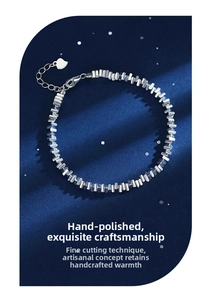 Close-up of S999 sterling silver beaded bracelet with adjustable heart charm and faceted cubes