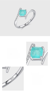 Macro detail of S925 sterling silver ring showing Paraiba tourmaline stone and S925 stamp