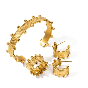 18K gold plated stainless steel jewelry set with textured bark finish and beaded edges