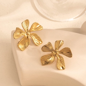 Luxury gold flower earrings with brushed metallic texture in a premium vintage style