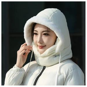 Detail view of cream winter hood scarf with white faux fur lining
