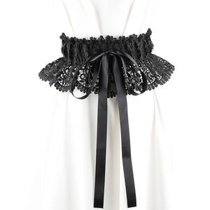 Detailed view of black floral lace waist corset with wide satin ribbon bow decoration