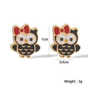 Detail showing 18K gold plated owl stud earrings with 1cm height and 3g weight specifications