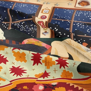 Detail shot of bohemian flannel tapestry showing soft fabric texture and artistic winter print