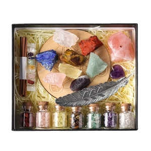 Healing crystal set with raw gemstones driftwood bottles and wooden energy plate in gift box