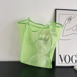 Vibrant lime green mesh tote bag with white tulips inside, stylish casual beach shoulder bag